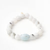 faceted white moonstone bracelet with light baby blue aquamarine center stone