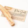 piece of palo santo along with its informational card with instructions on how to use for smudging